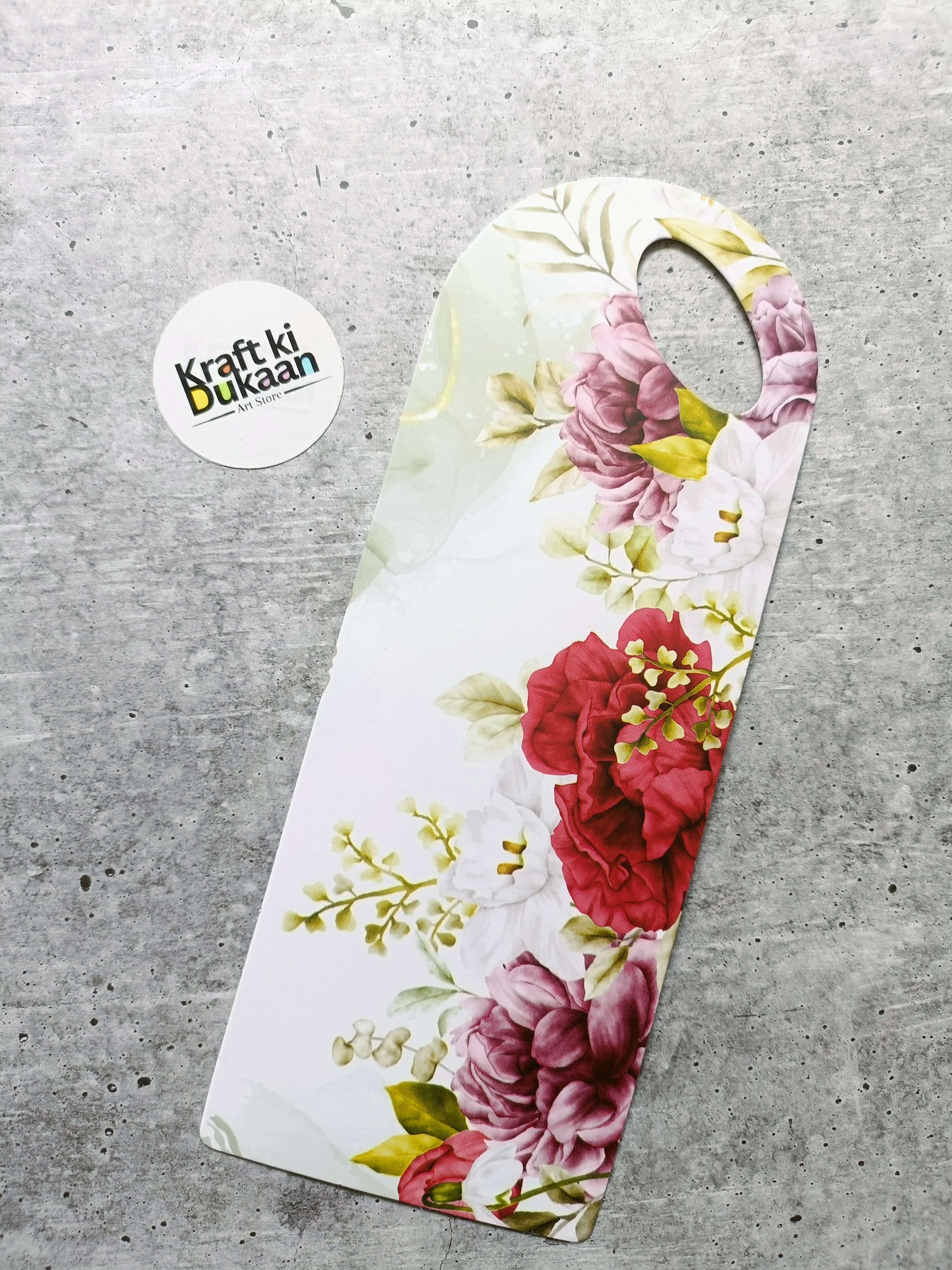 Small floral card holder, cream base with pink and red flower illustration and handle hole