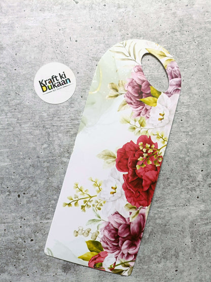 Small floral card holder, cream base with pink and red flower illustration and handle hole