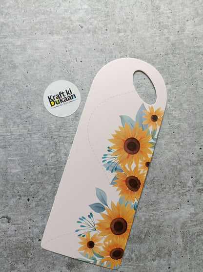 Small floral card holder, light base with yellow sunflower pattern and round handle hole