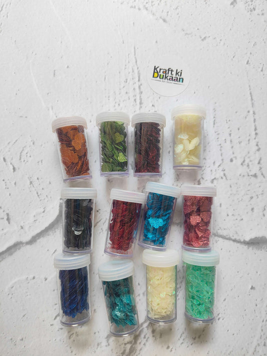 Set of 12 sequins jars with mixed colors in small clear containers