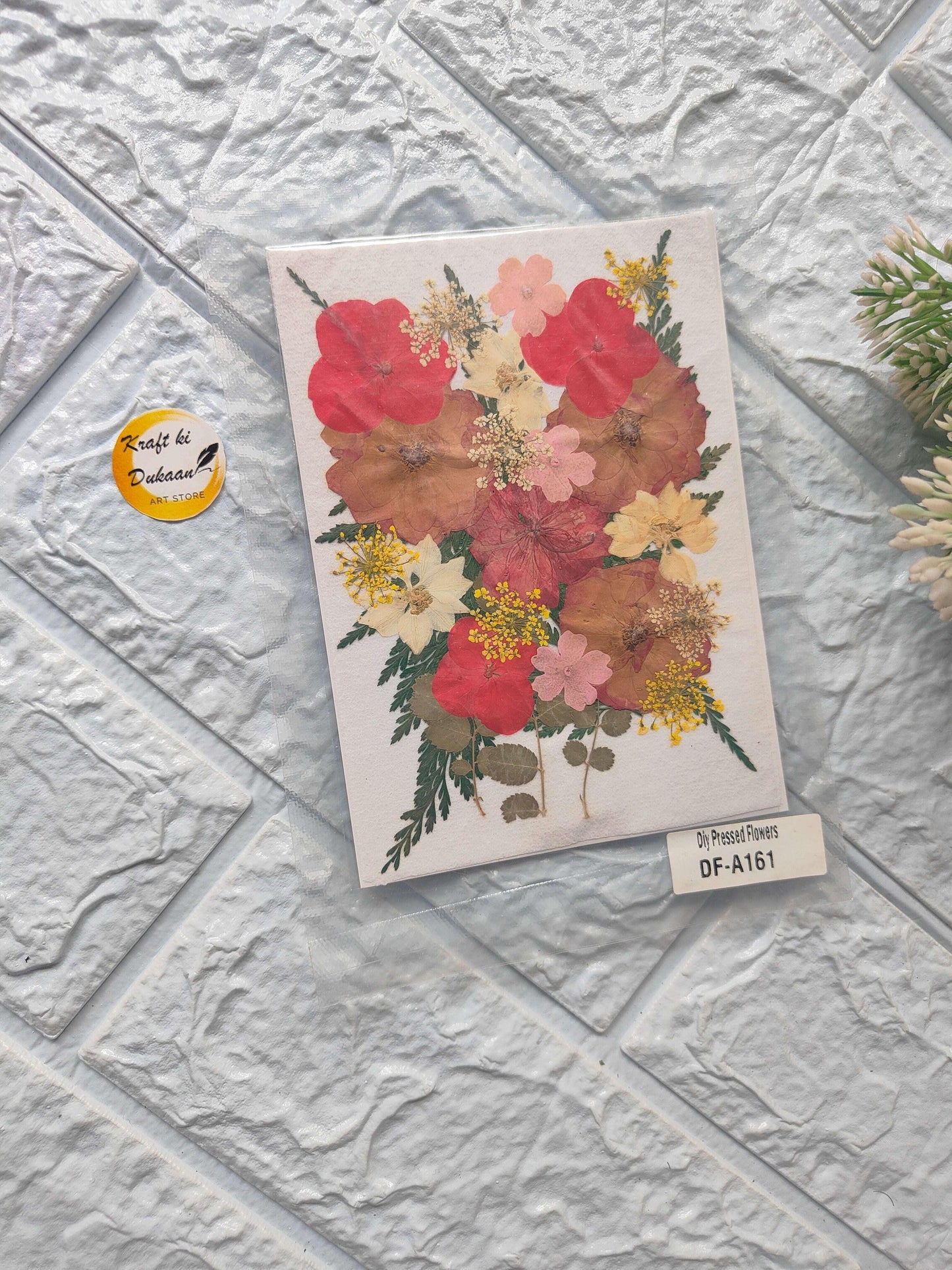 A4 compressed flower sheet mix with red, pink and yellow blossoms on off-white paper