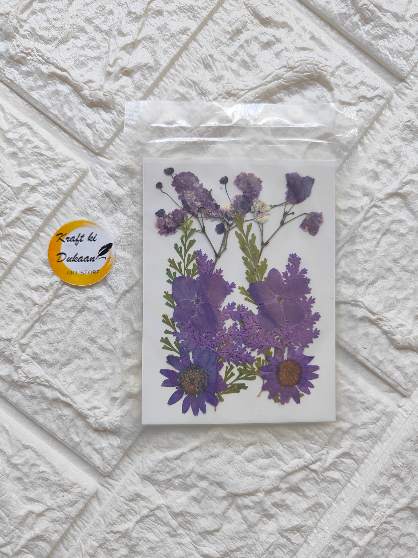Pressed flower sheet purple mix featuring various dried purple flowers for crafting and decoration
