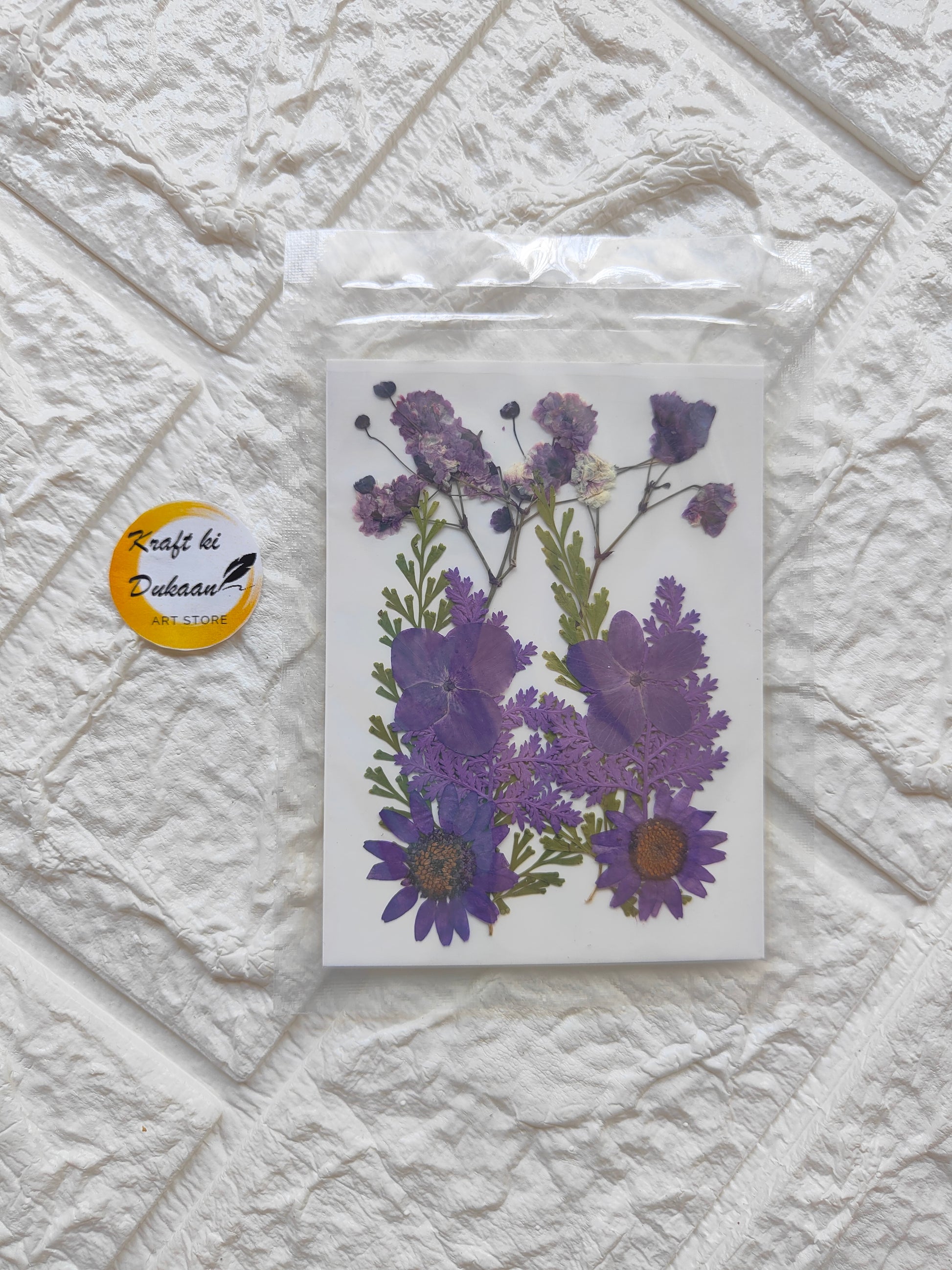 Pressed flower sheet purple mix featuring various dried purple flowers for crafting and decoration
