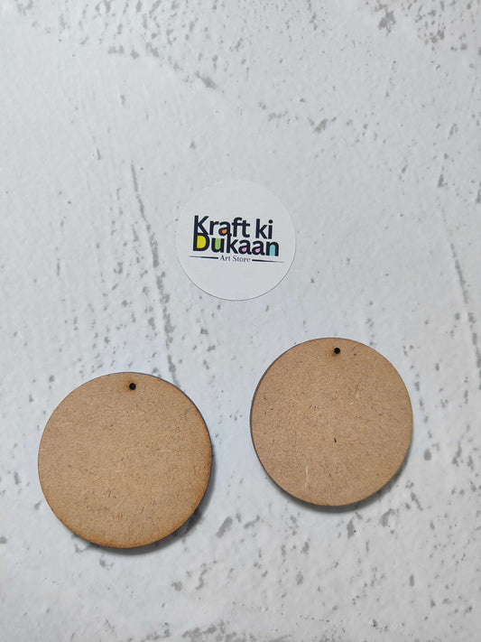 Two round MDF craft tags with top holes, natural brown