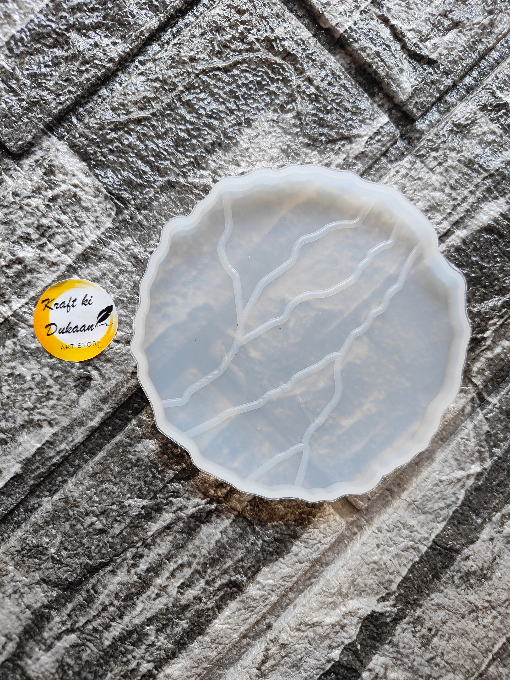 4 inch agate coaster mold for resin by Kraft ki Dukaan with detailed veining design on textured surface