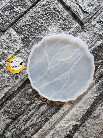 4 inch agate coaster mold for resin by Kraft ki Dukaan with detailed veining design on textured surface