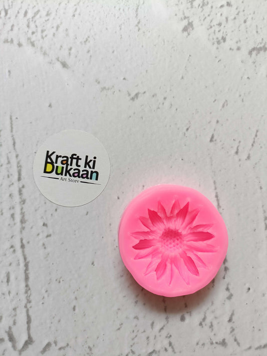 Pink flower mould with detailed petal sunburst design