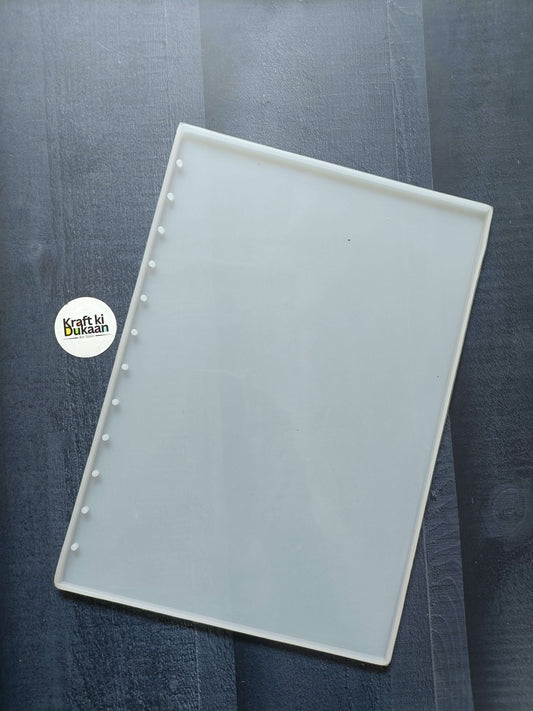 A4 notebook mould, rectangular with raised edges and row of punched holes