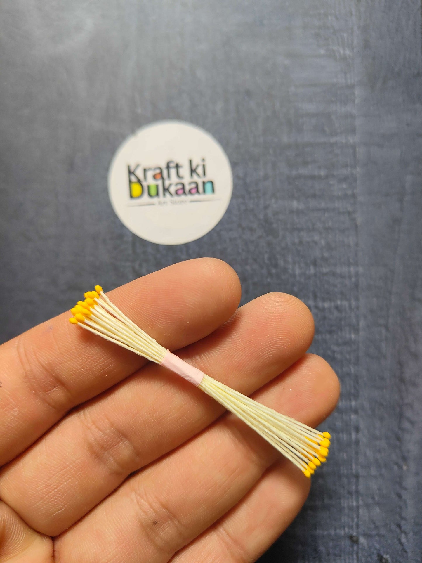 Artificial Pollens 6CM bunch with bright yellow tips on white thread-like stems.