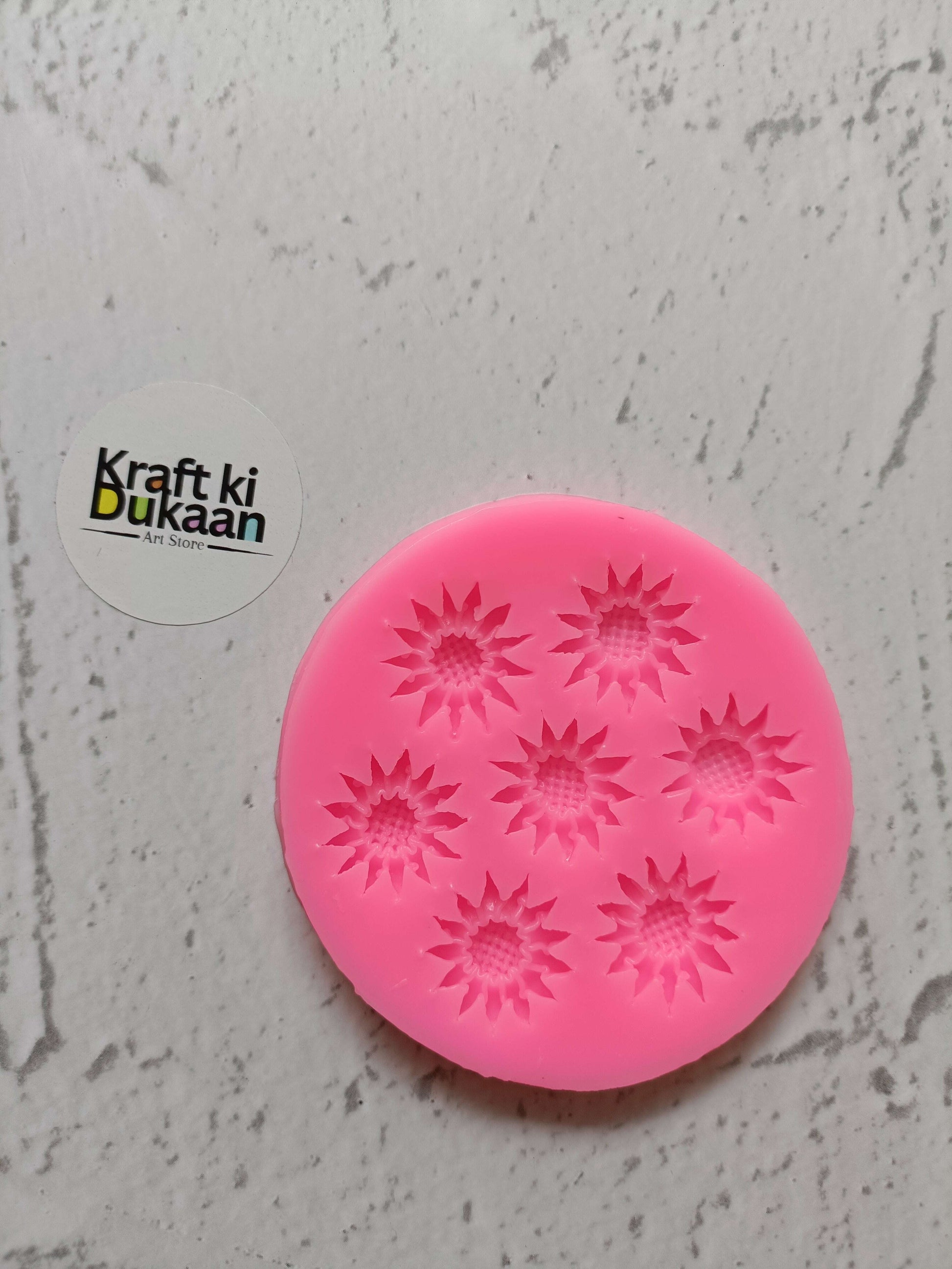 7 cavity pink flower mould with seven star-like flower cavities