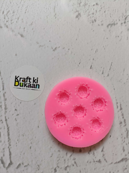 Pink flower silicone mould with 7 cavities, round mold with embossed flower shapes
