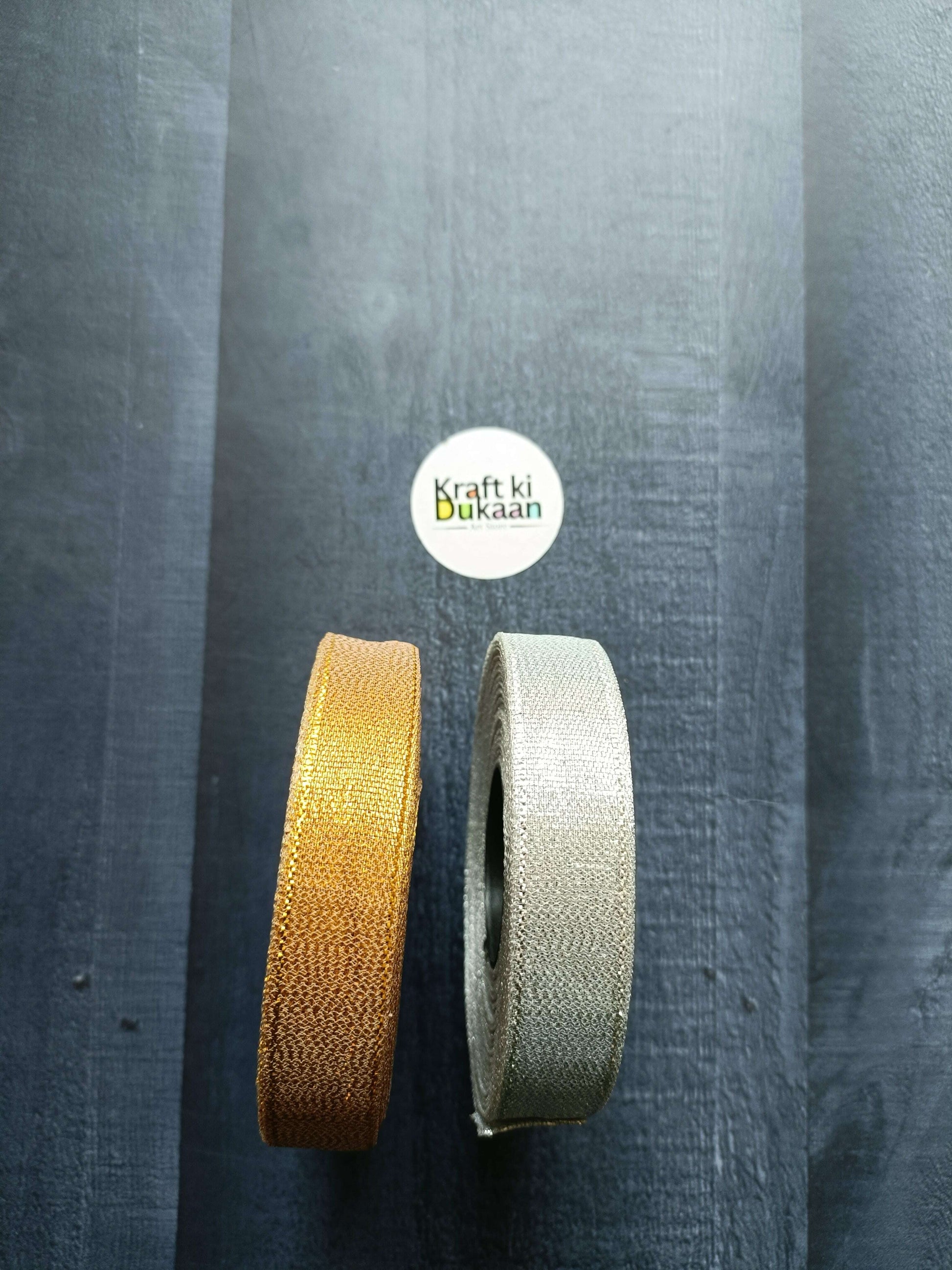 Tissue Ribbon Roll, Golden and Silver rolls shown side by side