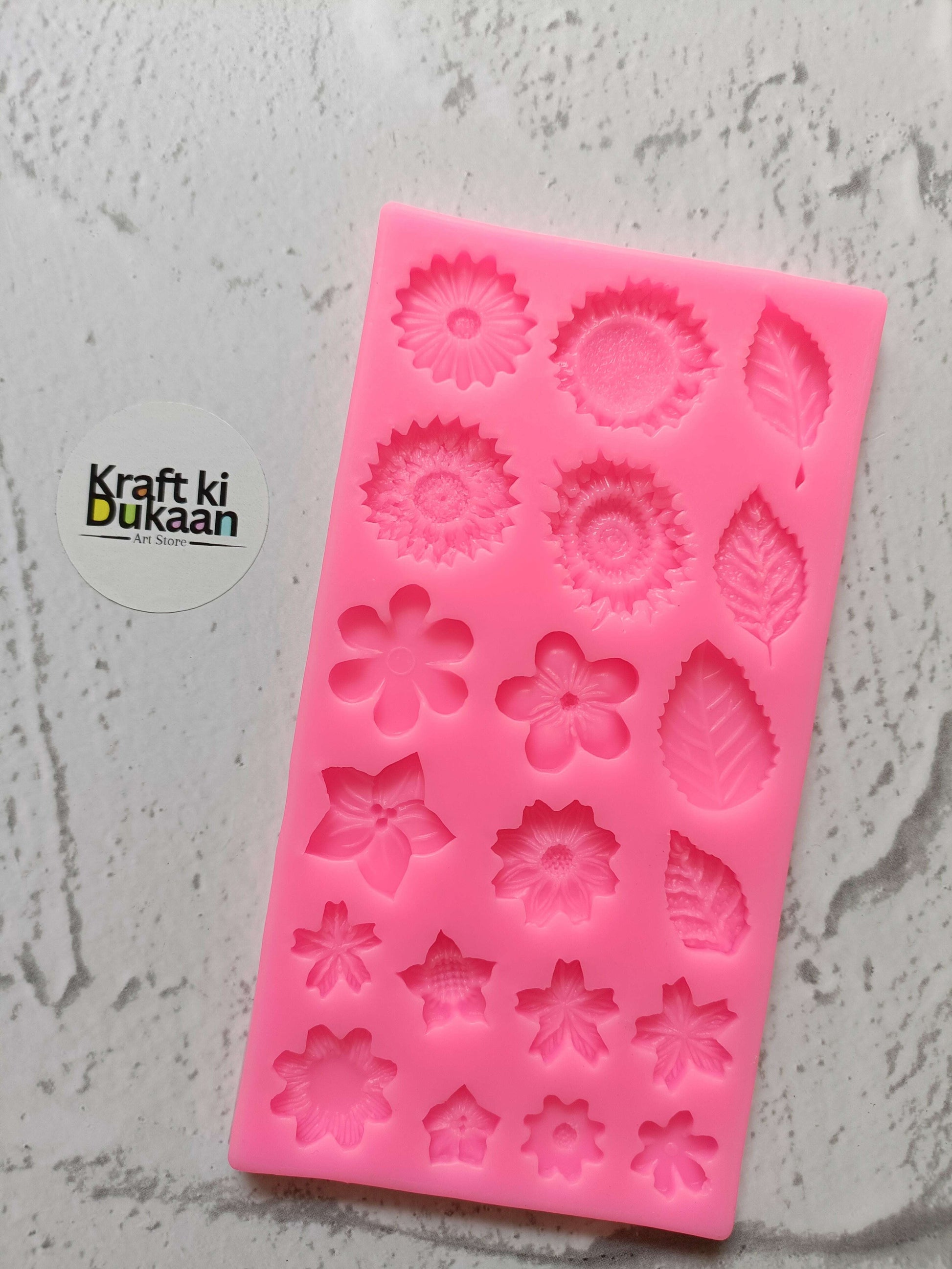 20 cavity pink flower silicone mould with assorted floral medallion shapes