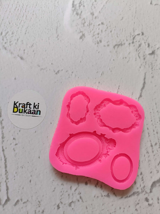 Pink 4-cavity mirror mould with round and oval embossed shapes