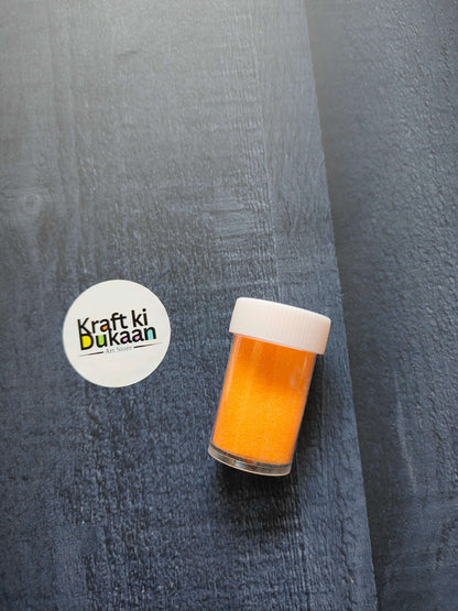Colored Sand jar, orange granules with white screw cap