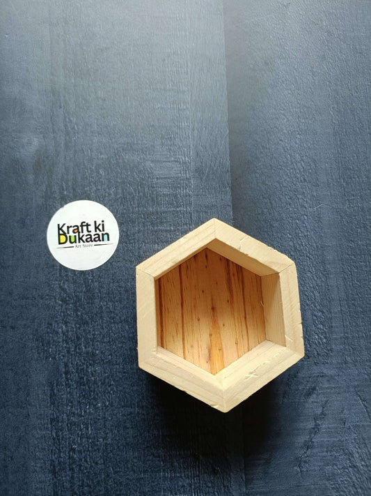 Wooden box, empty hexagonal frame with visible interior