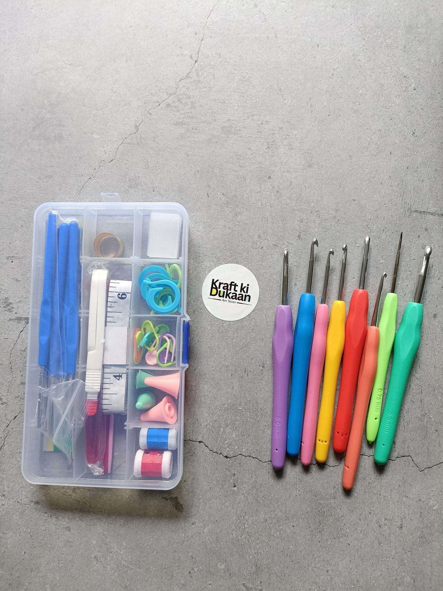 52-piece knitting crochet hook needle kit in clear case with colorful hooks and gauges