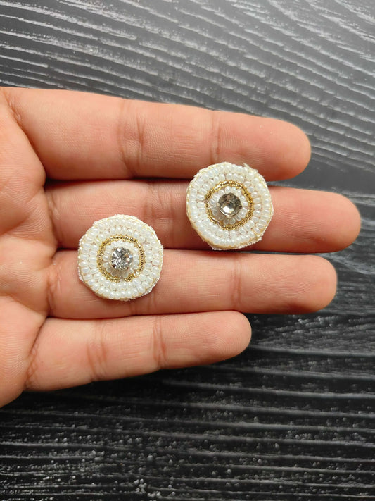 Round pearl-look patches with clear gem and gold ring, on fingertips (2 shown)