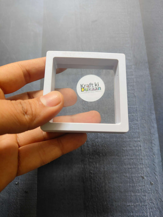 Display Box 7x7cm, white frame with transparent window and “Kraft ki Dukaan” logo