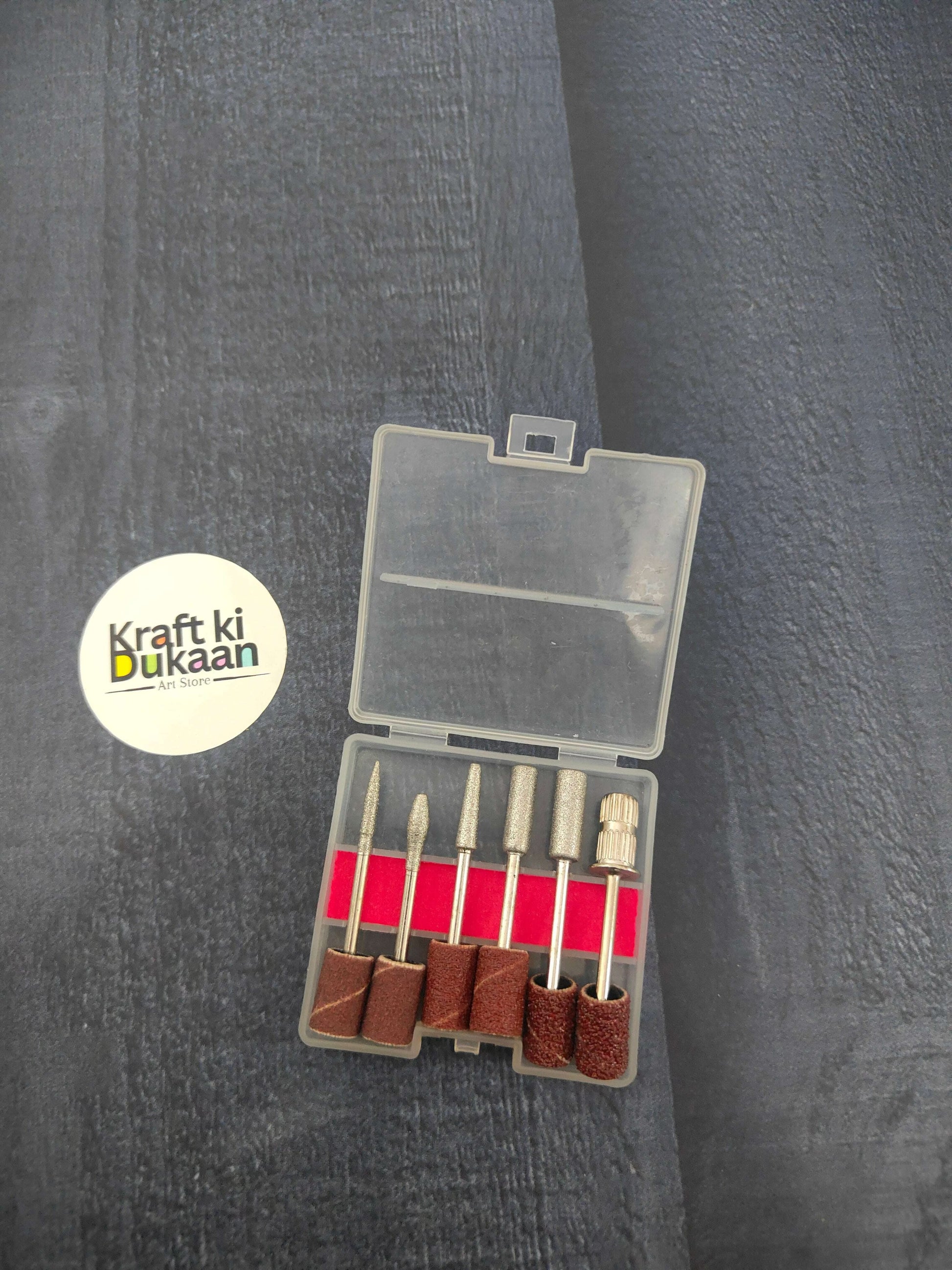 6-piece sanding tool kit with assorted grinding bits in clear plastic case