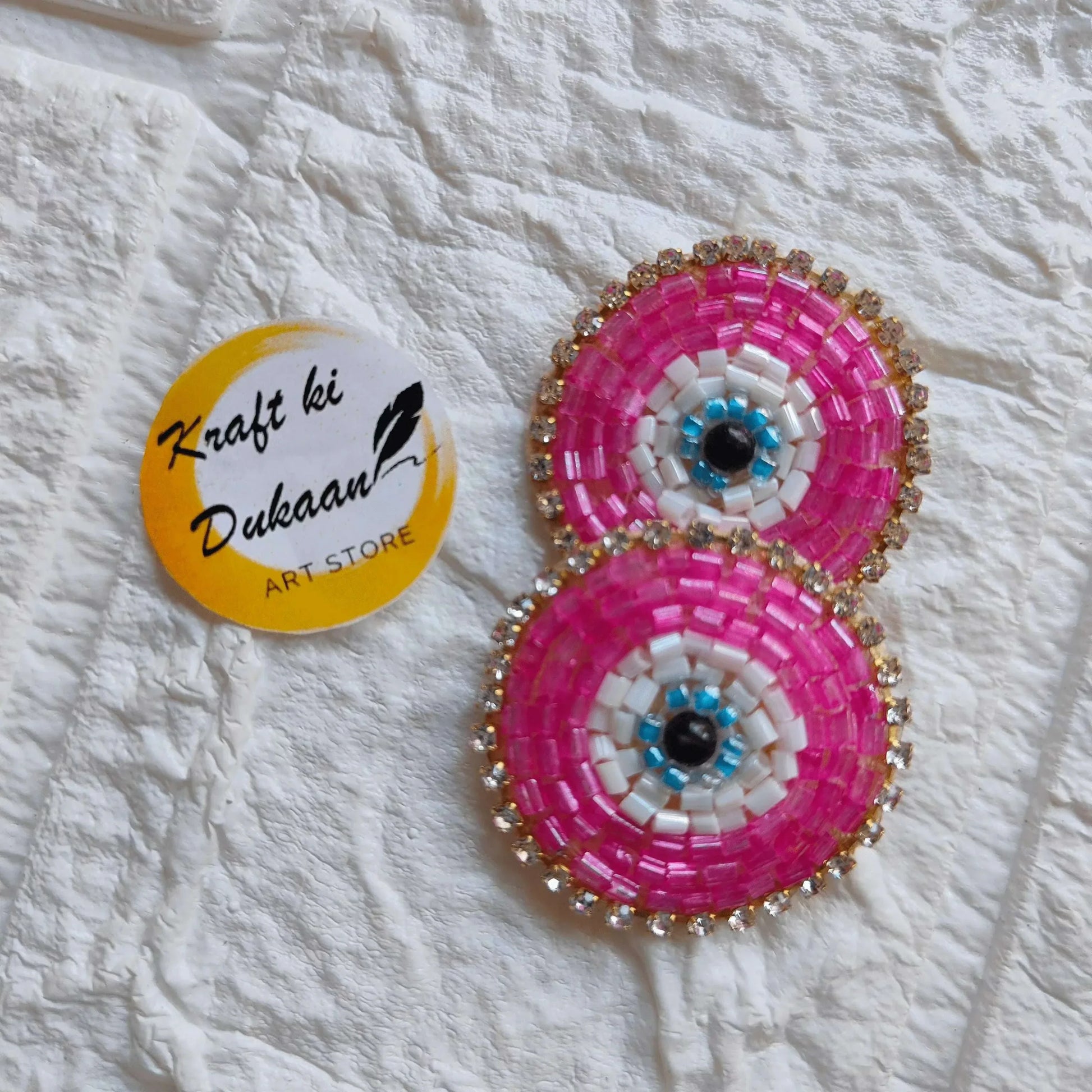 Beaded evil-eye embroidered patches, two fuchsia oval designs with dark teal center stones