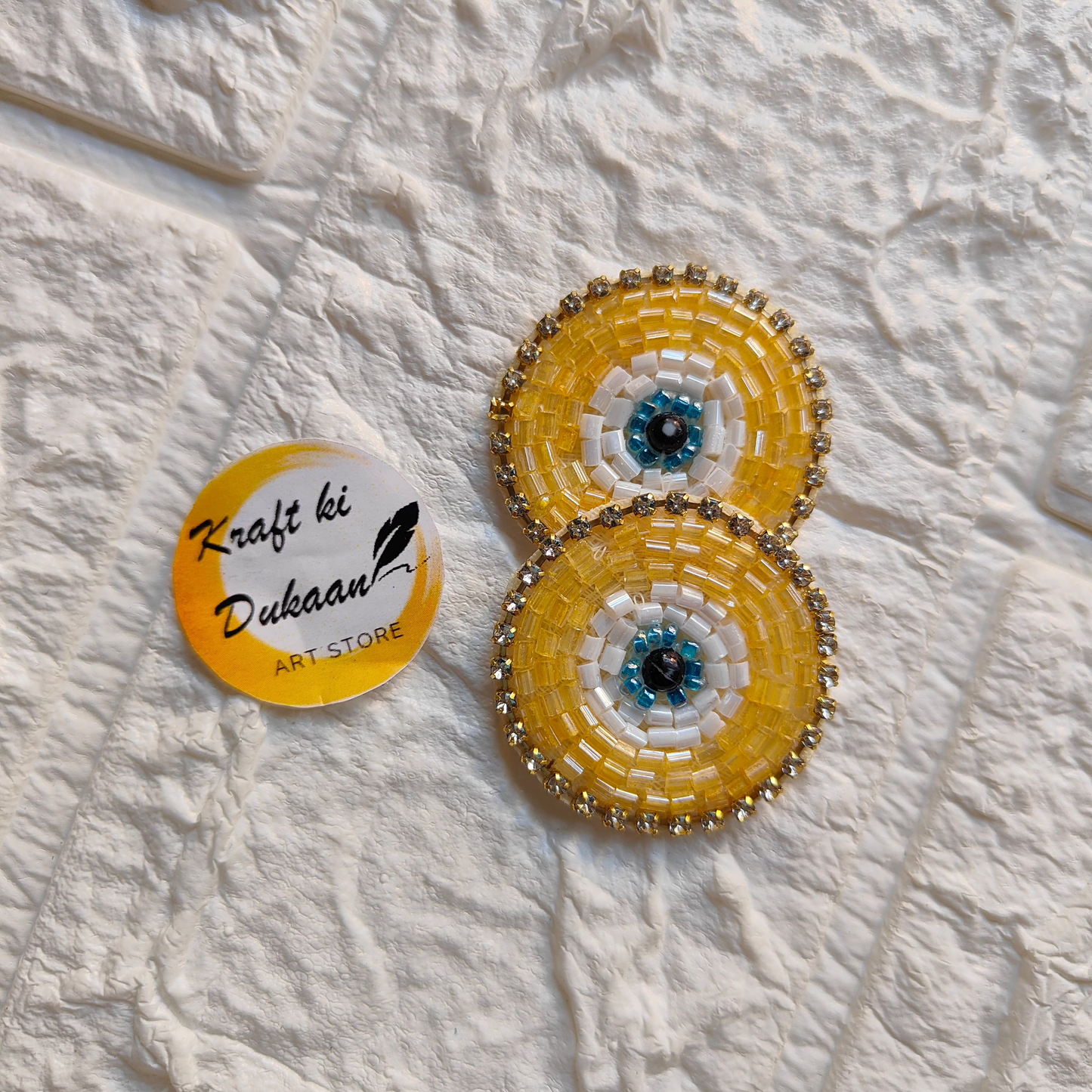 Evil eye embroidered patches in vibrant colors with beaded accents by Kraft ki Dukaan