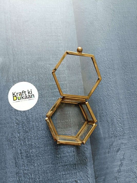 Brass hexagon glass keepsake box with hinged top and clasp