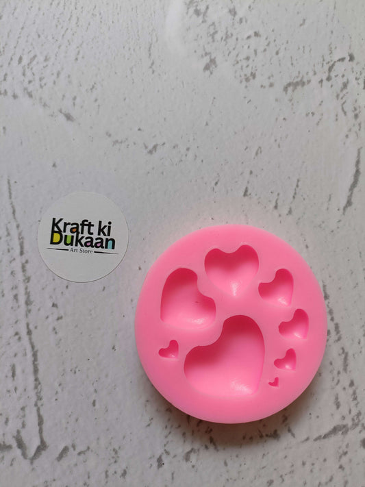 Pink silicone mold with 8 cavity heart shapes
