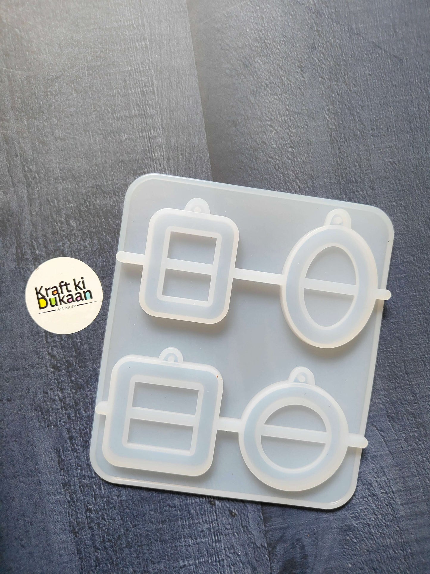 4-cavity keychain mould featuring two square and two oval mould shapes