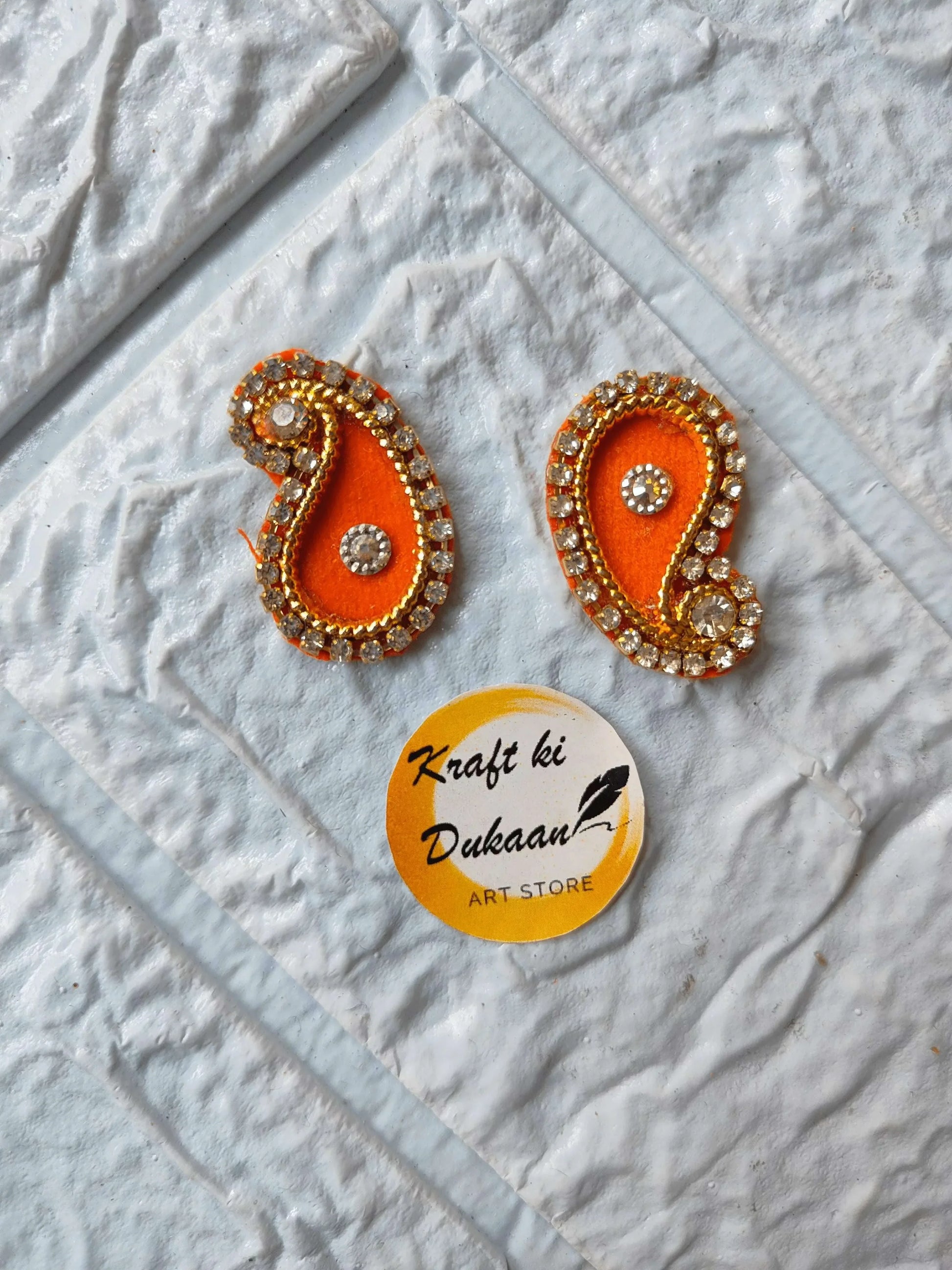 Kundan Patch Booti pack: orange-red paisley patches with gold bead border and rhinestones
