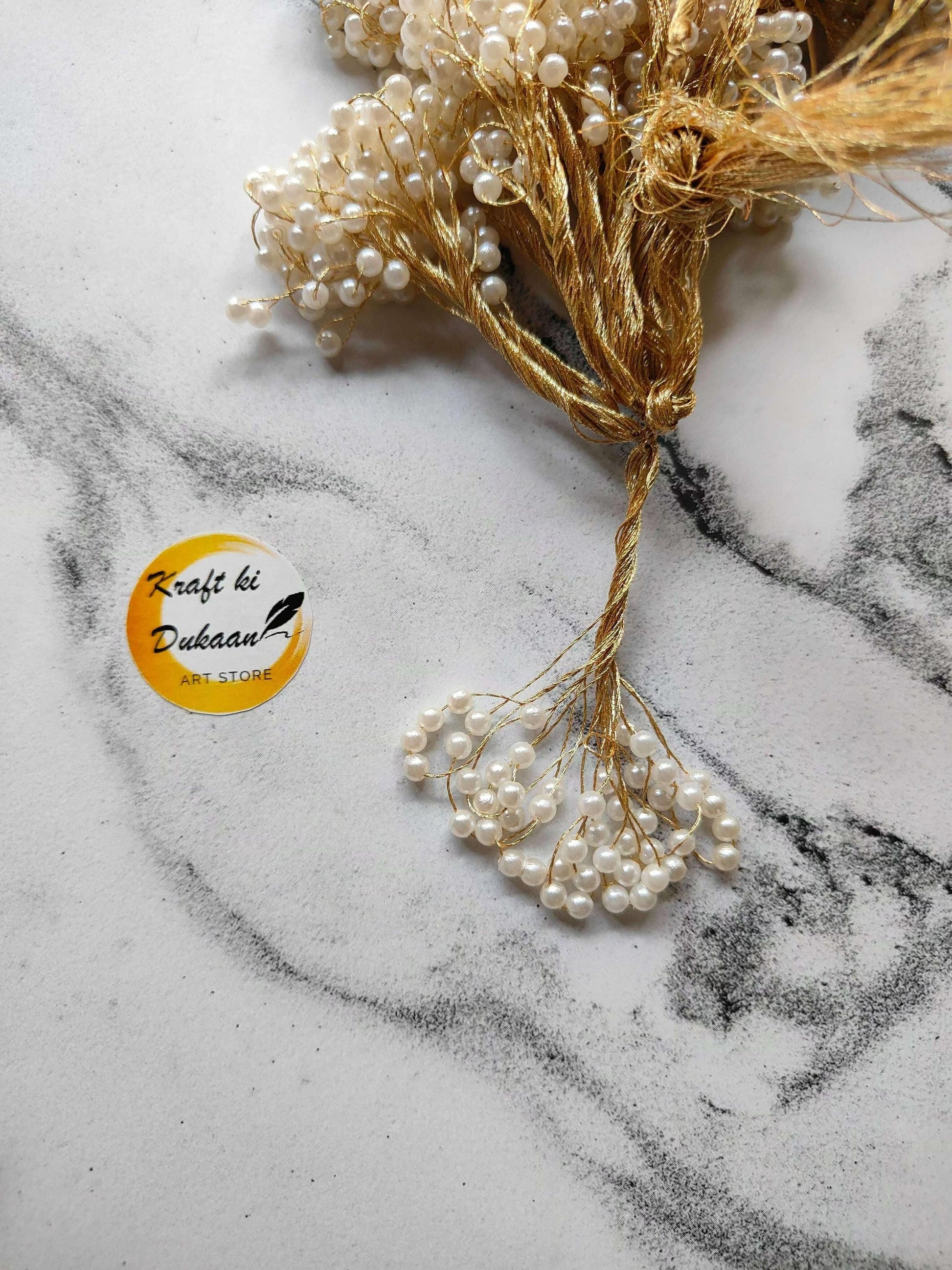 Latkan Set of 12 A9: gold string with pearl bead tassel cluster