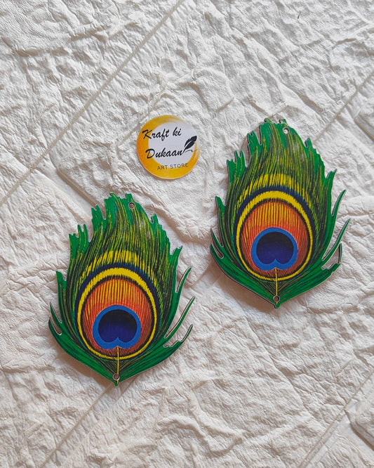 Colorful MDF peacock feather cutout pair with detailed vibrant design from Kraft ki Dukaan