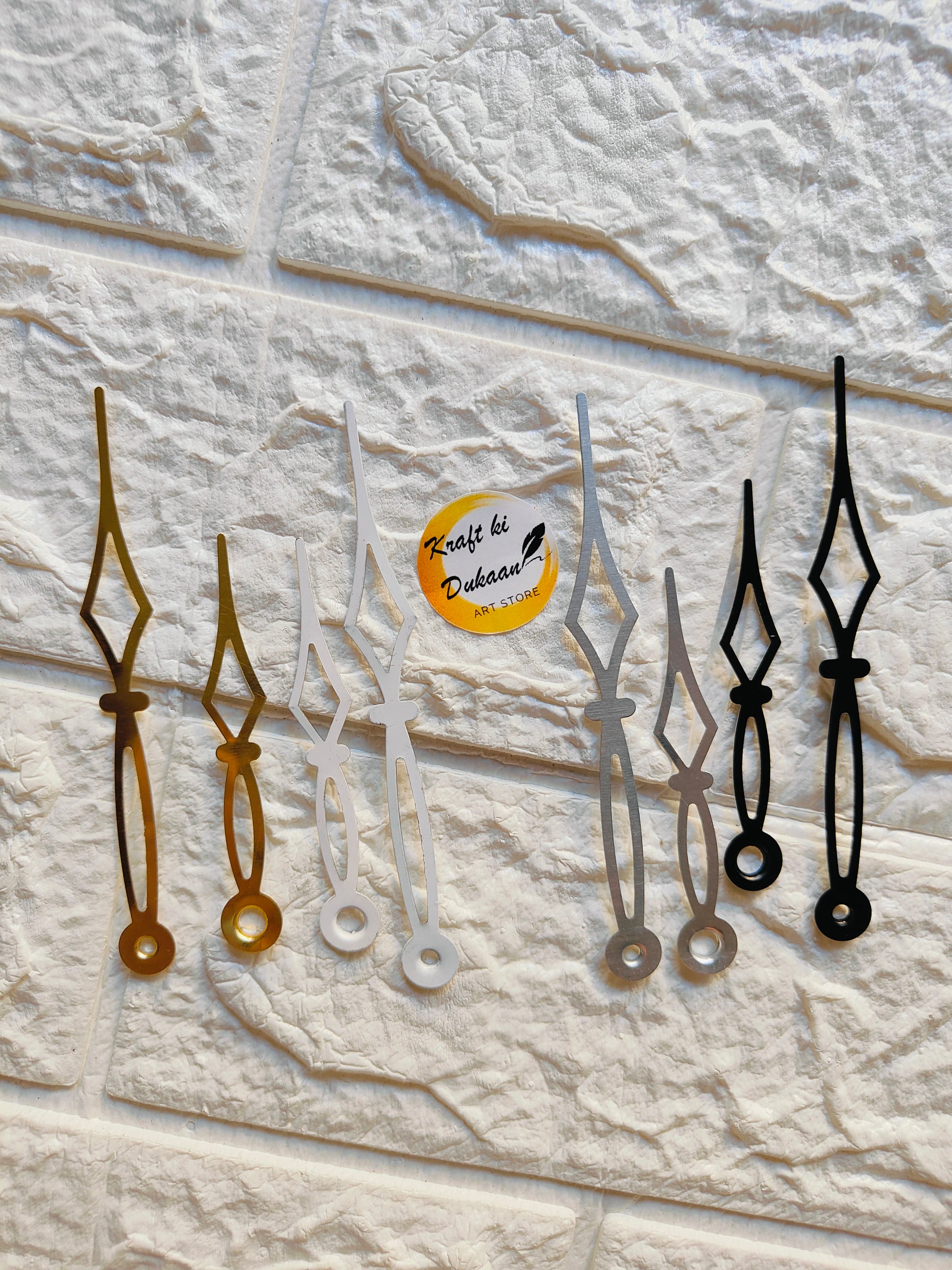 Set of metal clock hands for crafts in various colors for DIY clock projects