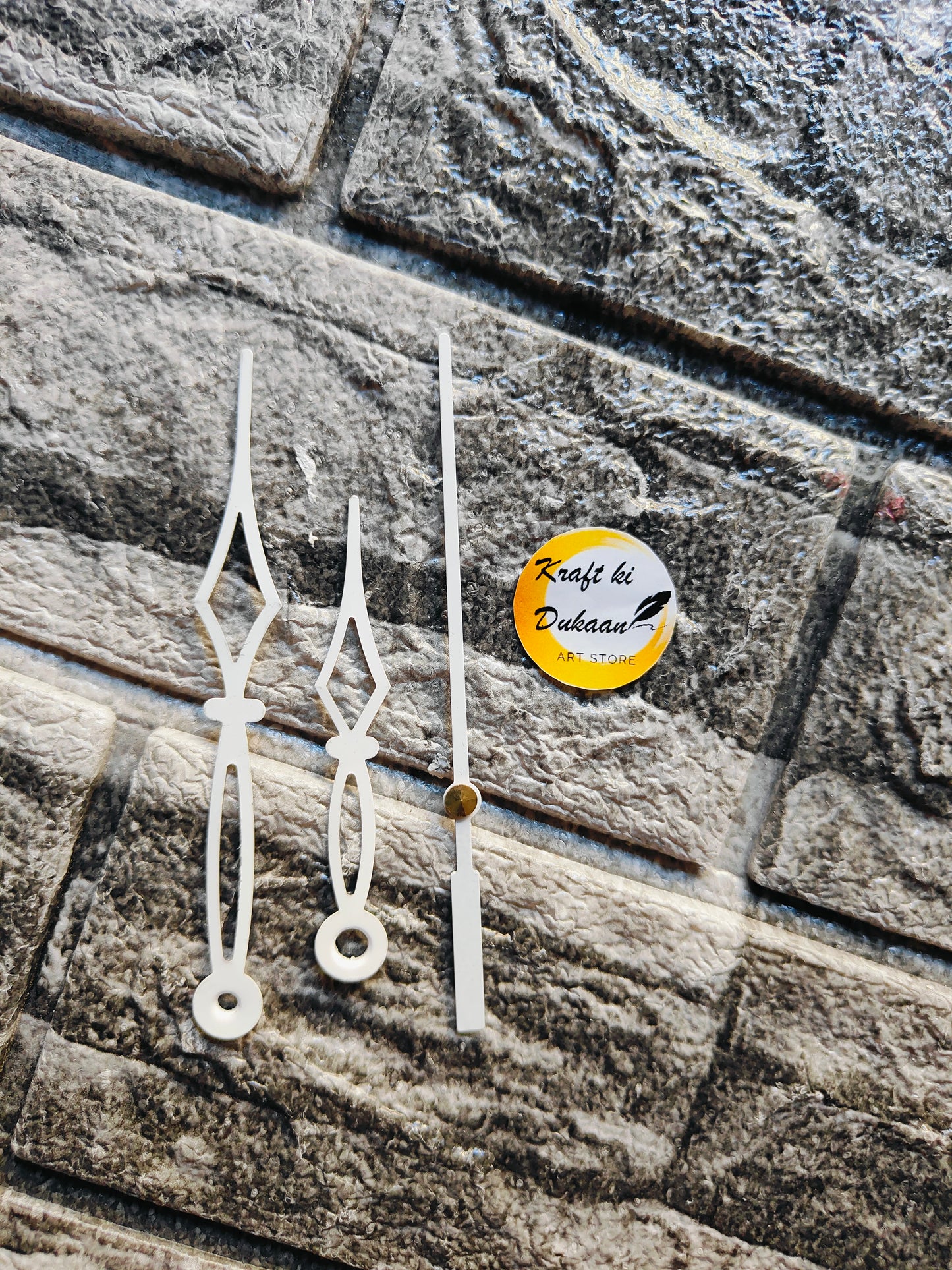 Metal clock hands for crafts in white, perfect for DIY clock projects and artistic creations
