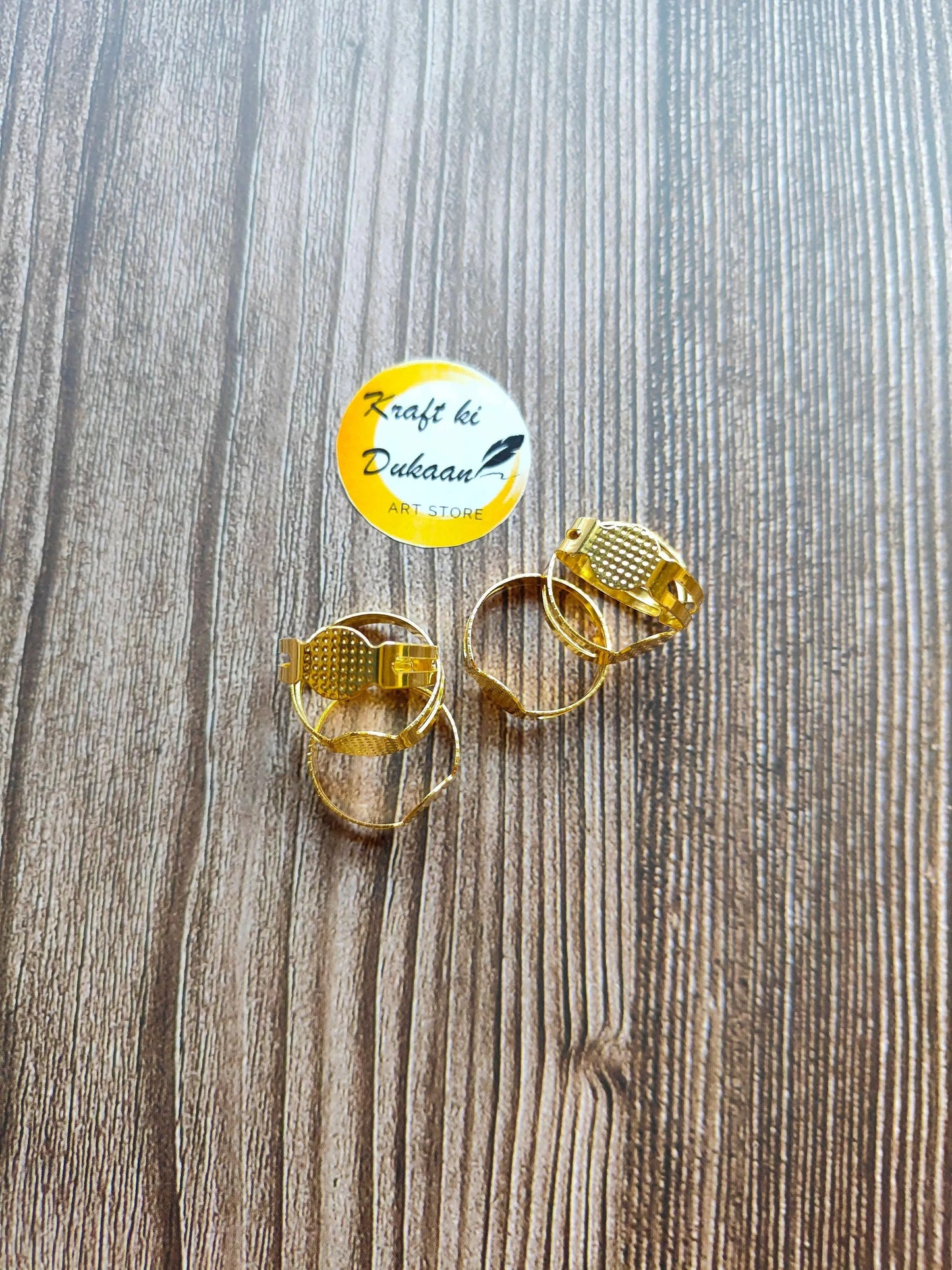 Gold-tone ring base set of two with textured bead caps