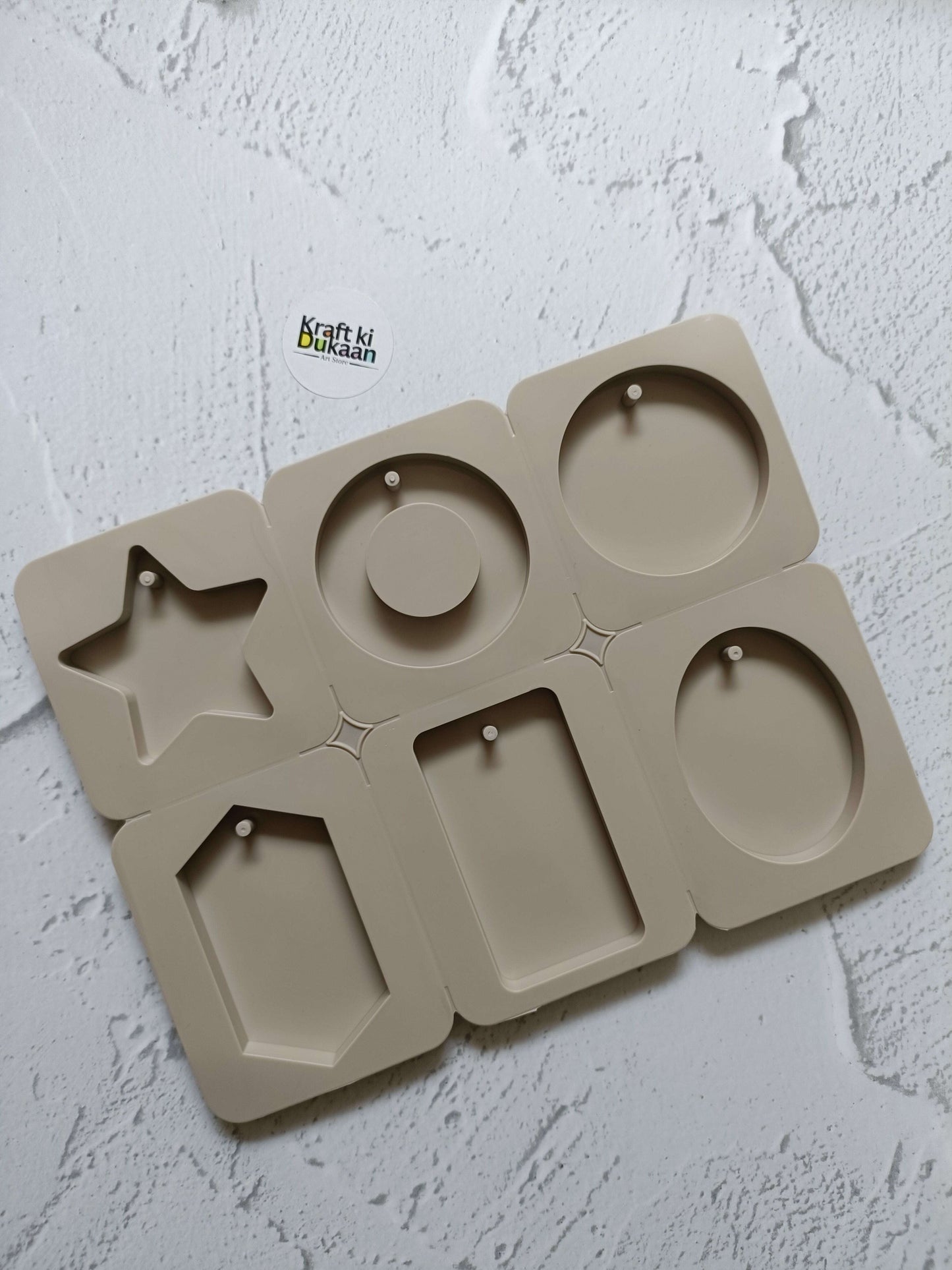 6-cavity tag mould tray with star, circles, and rectangle shapes for labels