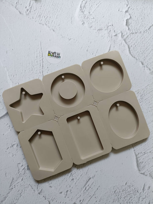 6-cavity tag mould tray with star, circles, and rectangle shapes for labels