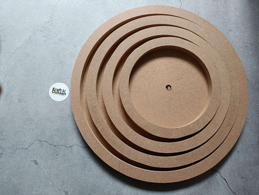 Round MDF wall mural with concentric rings and center hanging hole, kraft brown