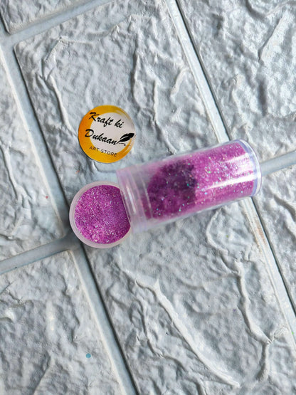 Neon glitter tube in violet purple with matching round glitter cap