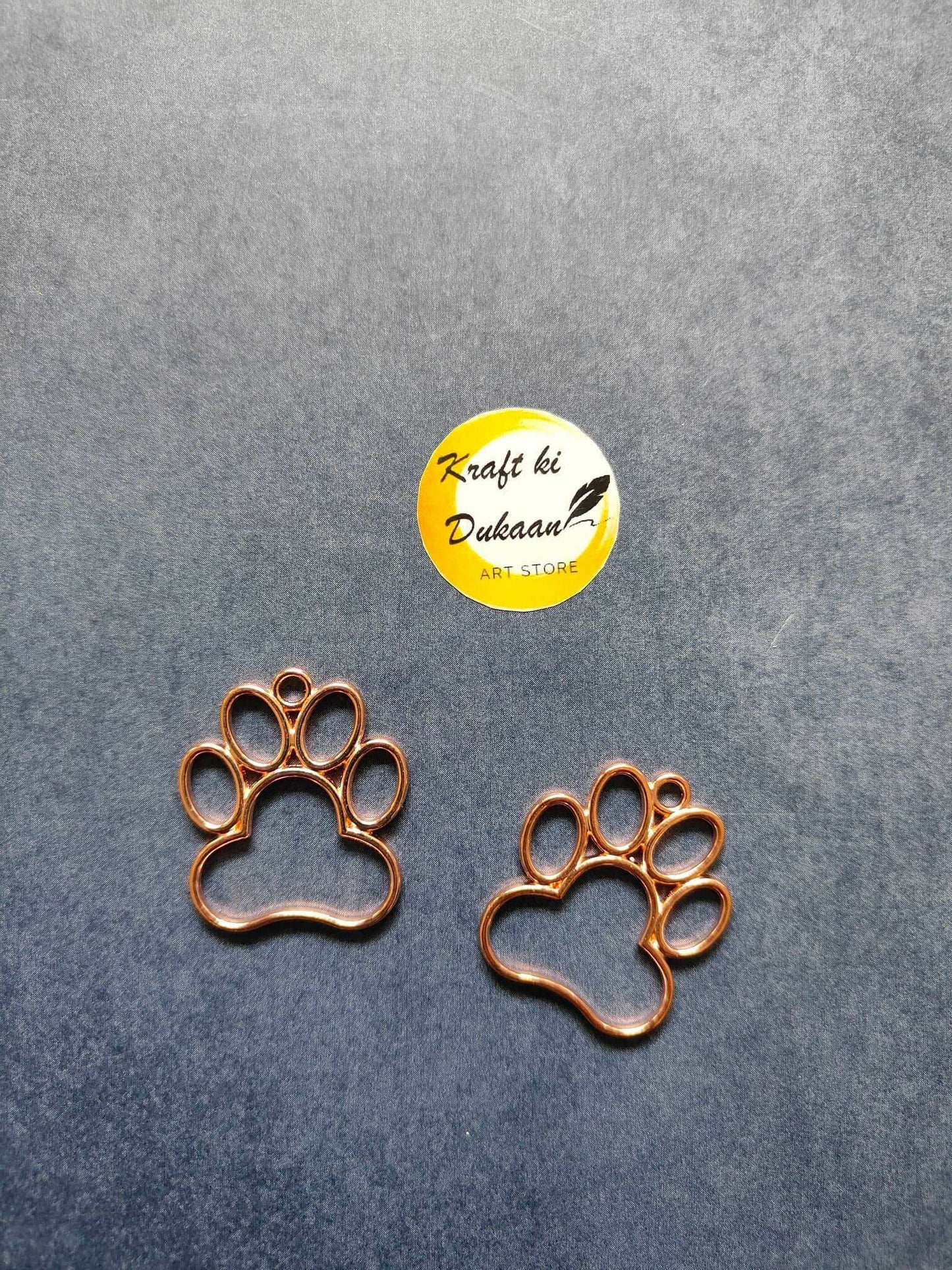 Rose gold paw bezel pendant with round bezel paw print, single charm