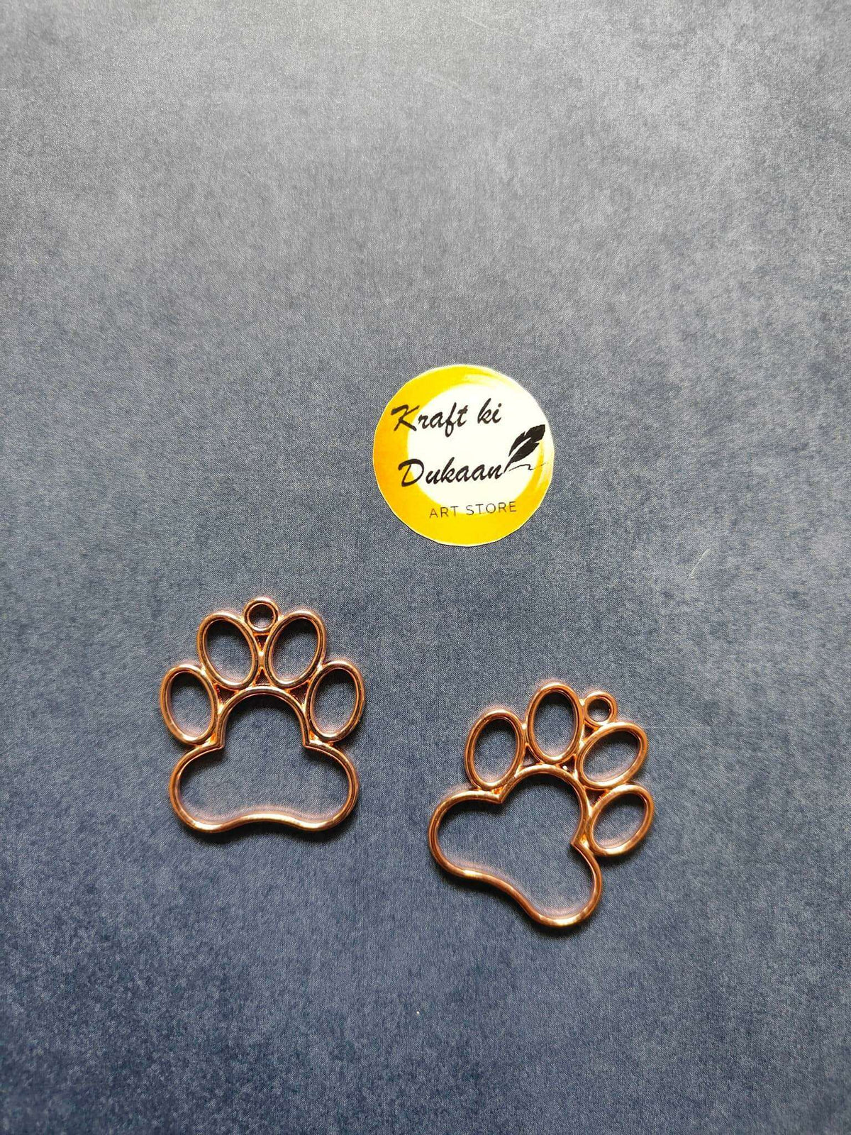 Rose gold paw bezel pendant with round bezel paw print, single charm