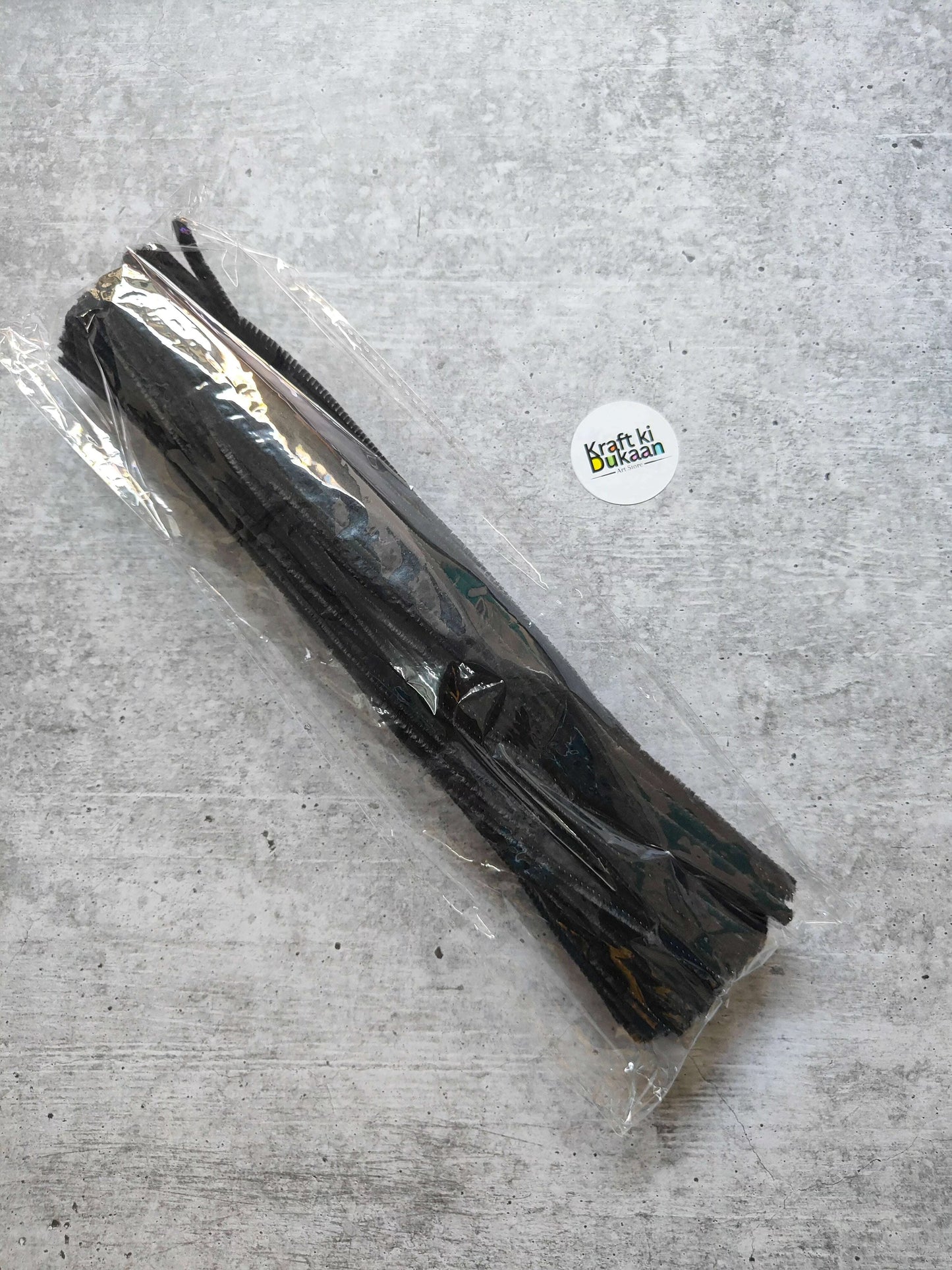 Black plain pipe cleaners, pack of 100, bundled in clear plastic wrap