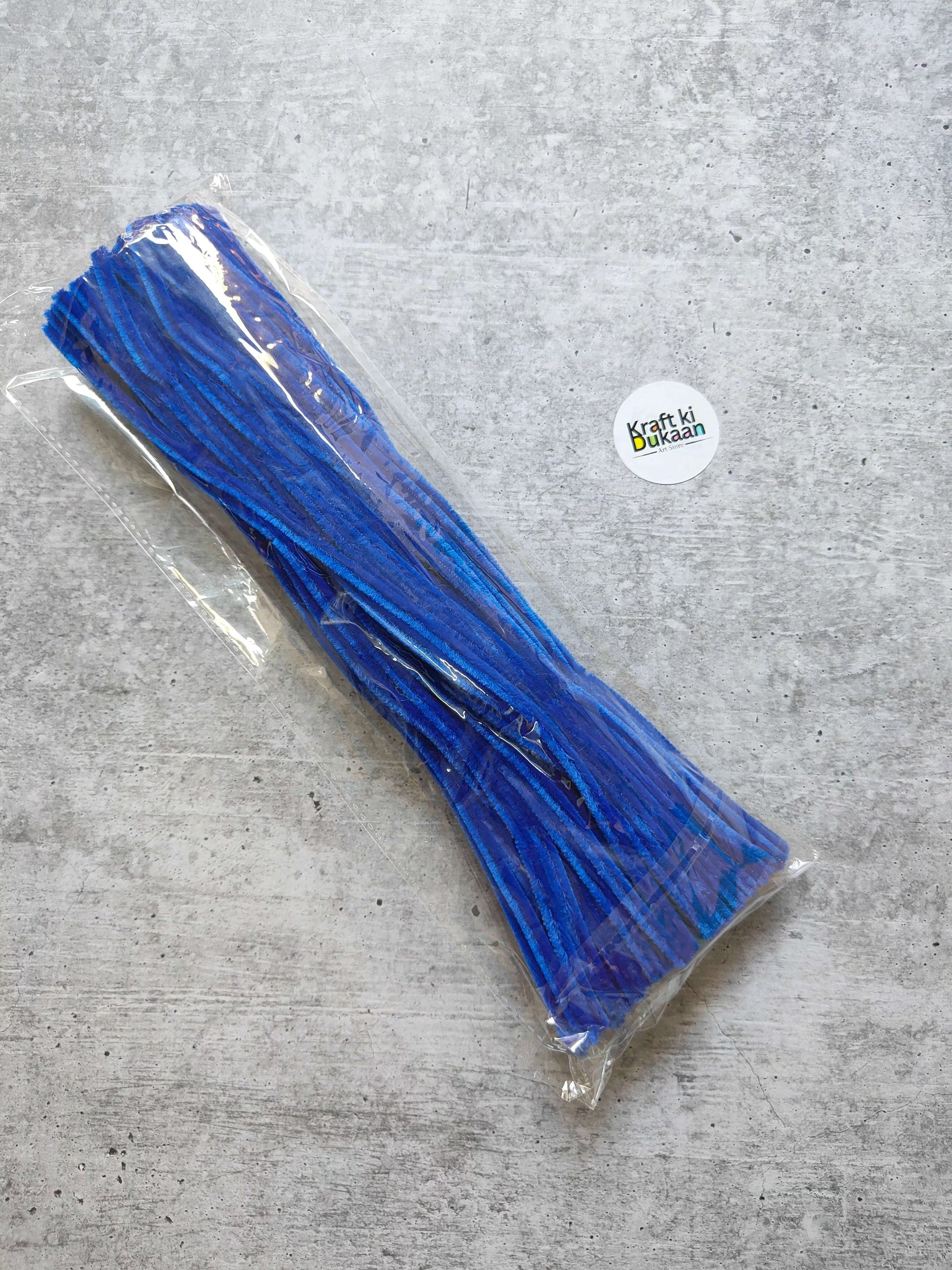 Royal blue plain pipe cleaners, pack of 100, bundled in clear plastic wrap