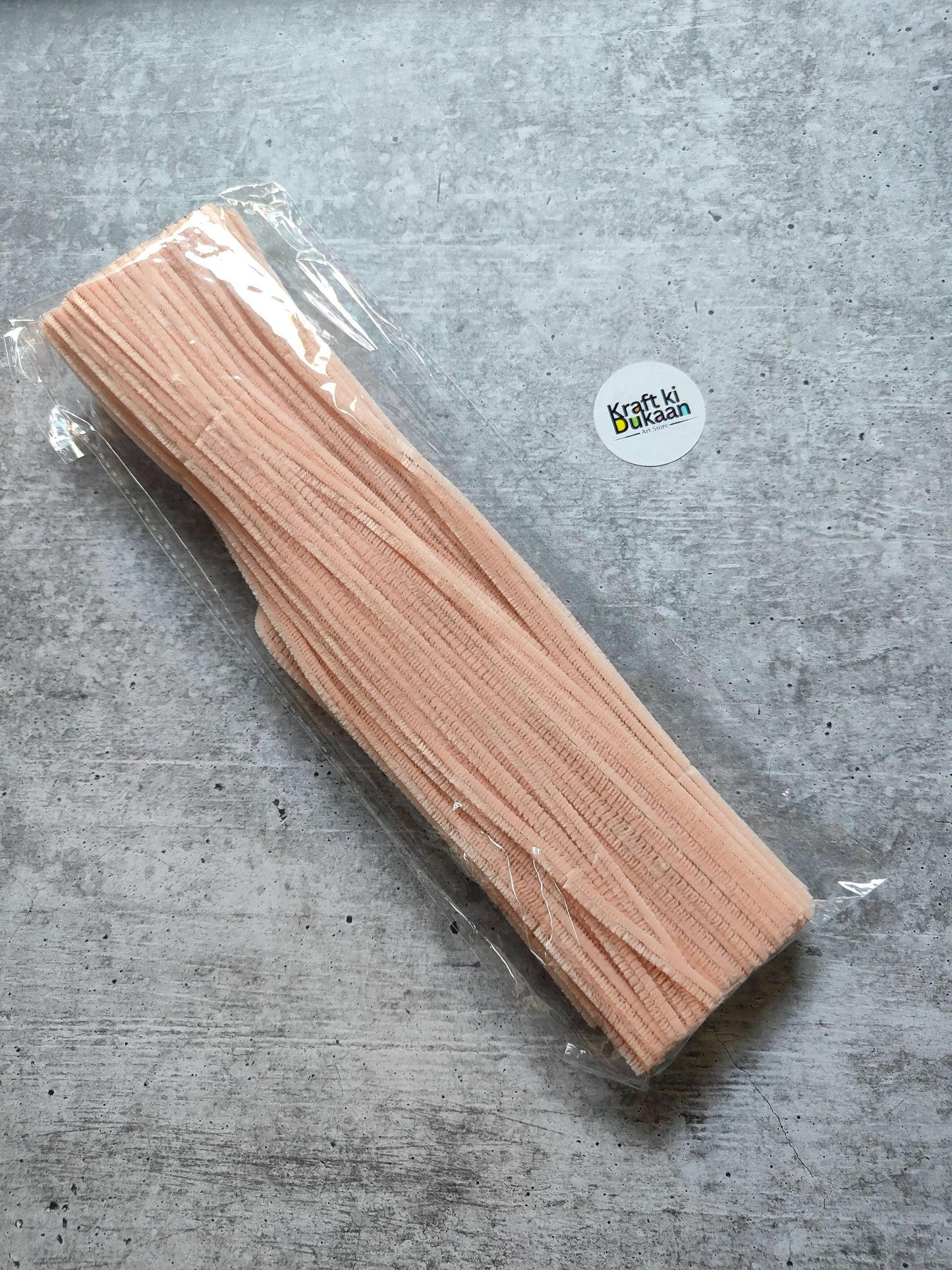 Peach plain pipe cleaners, pack of 100, bundled in clear plastic wrap
