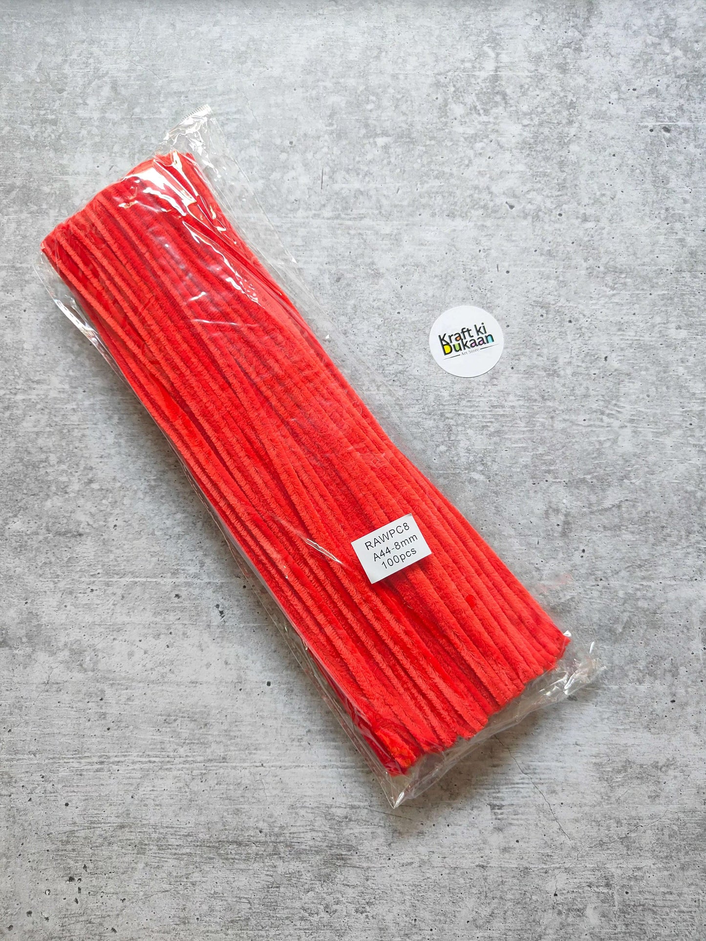 Red plain pipe cleaners, pack of 100, bundled in clear plastic wrap