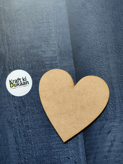 Light tan MDF heart cutout, blank front for crafting