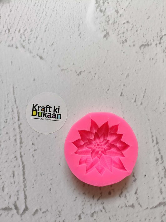Poinsettia Flower Pink Mould: pink silicone flower mold with circular petal pattern
