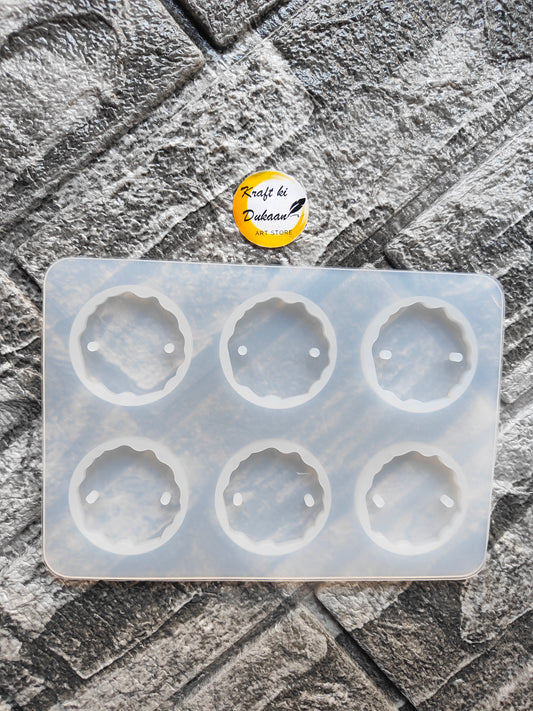 Silicone Resin Rakhi Mould with six circular cavities for crafting colorful rakhis