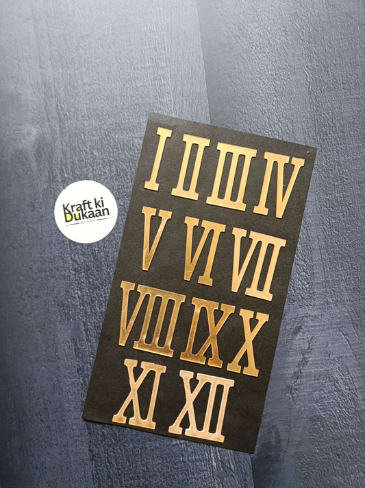 Gold acrylic Roman numeral stickers on dark backing, set of I–XII