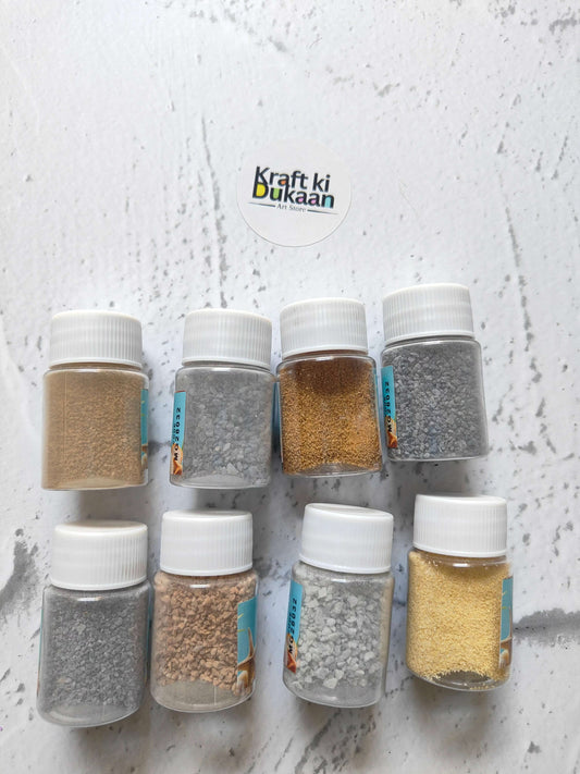 Colored granules sand pack of 8 with jars of beige, brown, and gray granules